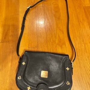MCM Black Crossbody Bag with Gold Accents